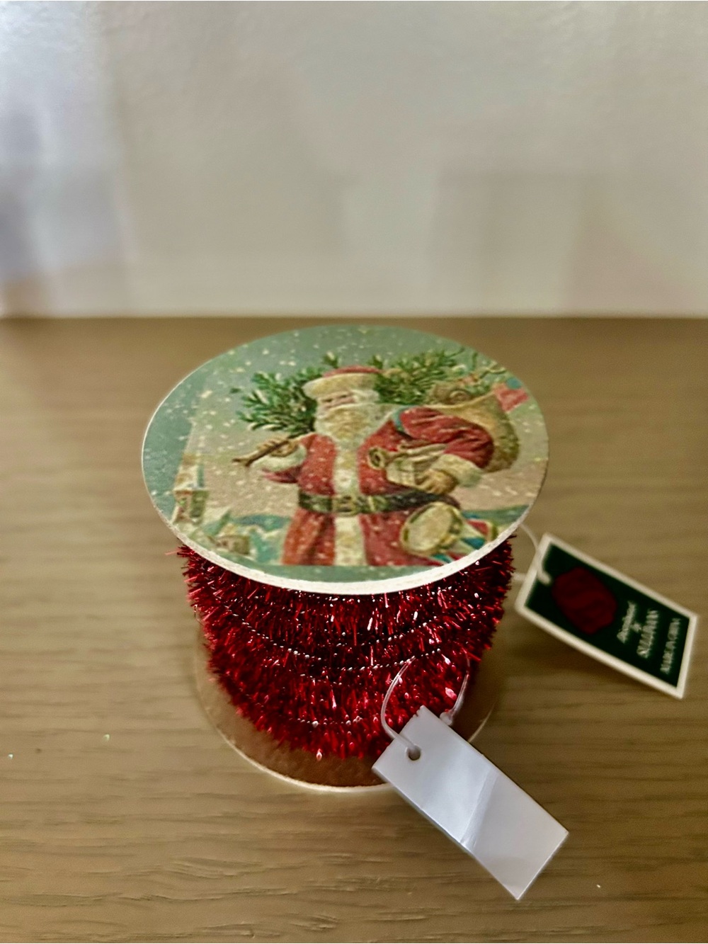 Red Tinsel Garland Spool with Santa Illustration - Festive Holiday Décor